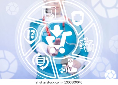 Young Medical Woman Working On A Virtual Screen Of The Future And Touches The Icon: Shopping Cart. Drugstore. Pharmacy Marketing Concept. Medical Procurement And Buying.