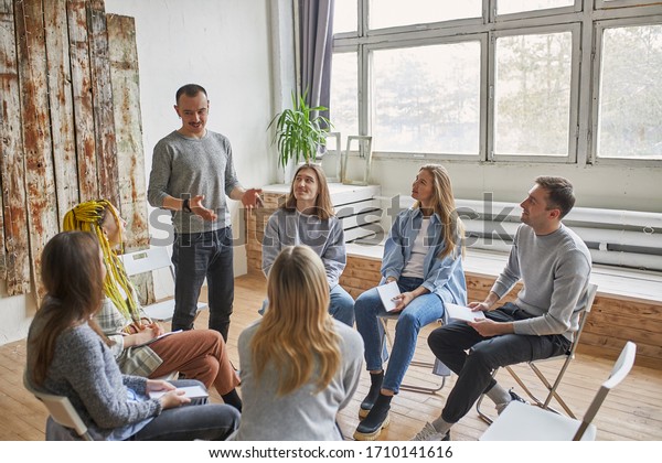 young\
members of anonymous alcoholics club share their experience, get\
support and psychological help, have conversation. help, support,\
alcoholics and drug users club, addiction.\
therapy