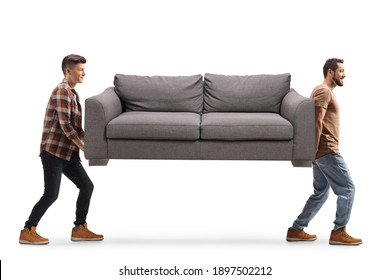 Young Men Carrying A Gray Sofa Isolated On White Background