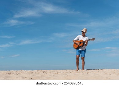 Young men playing acoustic guitar on the beach. Happy man person playing acoustic guitar music instrument seaside sitting on sand tropical beach island. Asian musician Happy guitarist hobby lifestyle - Powered by Shutterstock