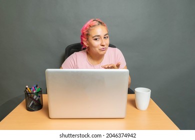 Young Mexican Student Front Of Laptop On Video Call. Latina Woman Working At Home