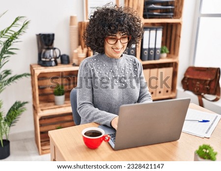 Young middle east woman business worker using laptop working at office