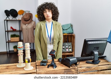 Young Middle Eastern Woman Working As Manager At Retail Boutique Depressed And Worry For Distress, Crying Angry And Afraid. Sad Expression. 