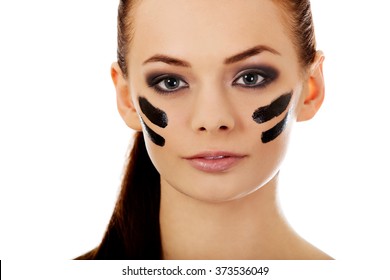 Young Military Women With War Paint On Face