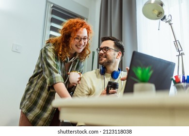 Young Millennial Couple Working At Home. Concept Of Freelance And Remote Work