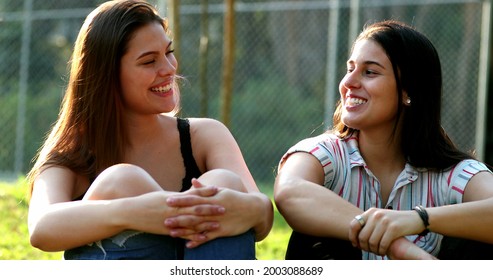 Young millennial women smiling and laughing together