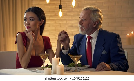 Young Mistress Ignoring Elderly Man During Date, Narcissist Female In Restaurant