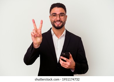 Young Mixed Race Business Man Holding A Mobile Phone Man Isolated On White Background Showing Number Two With Fingers.