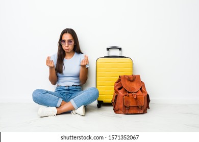 Young Mixed Race Indian Woman Ready To Go To Travel Showing That She Has No Money.