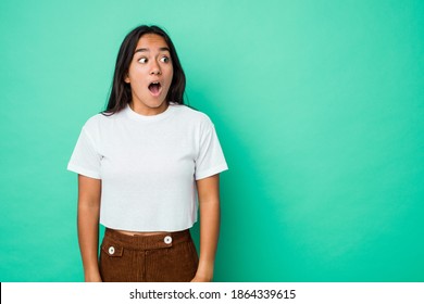 Young mixed race indian woman isolated being shocked because of something she has seen.
