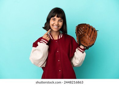 Young mixed race player woman with baseball glove isolated on blue background giving a thumbs up gesture - Powered by Shutterstock