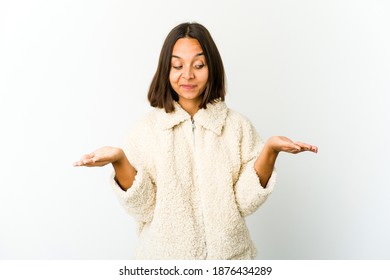 Young Mixed Race Woman Holding Something With Palms, Offering To Camera.