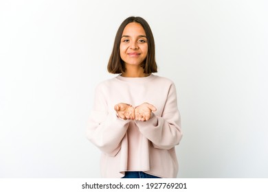 Young Mixed Race Woman Holding Something With Palms, Offering To Camera.