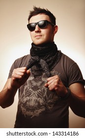 Young Mod In Sunglasses Posing In Studio