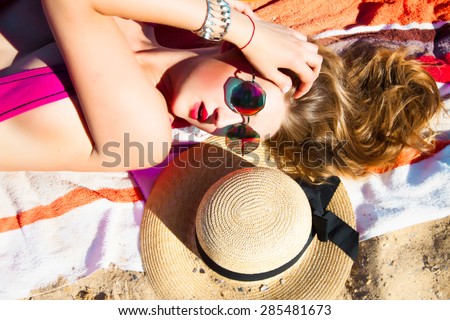 Similar – Woman applying sunscreen by the pool during summer