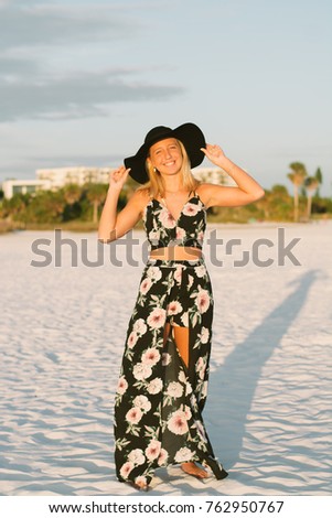 Young Model Posing on the Beach at Sunset