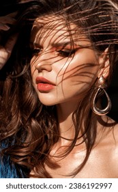 young model with professional make up and voluminous hairstyle