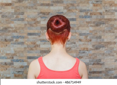 Young Model With Topknot And Hidden Undercut On Hair