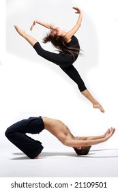 Young Modern Ballet Dancer Posing On White Background