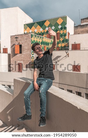 Similar – Image, Stock Photo young man simulating a photographic frame with his hands
