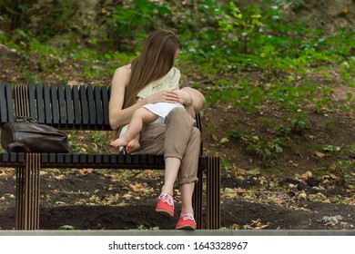 breastfeeding 10 year old baby outside