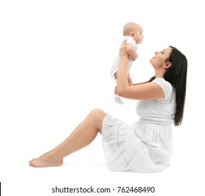 Young Mother And Cute Baby, Isolated On White