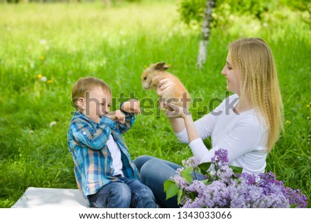 Similar – Image, Stock Photo Little girl and woman carrying basket with apples