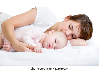 Young Mother And Her Baby Sleeping Together