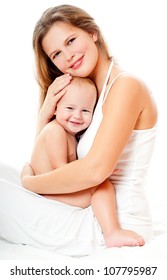 Young Mother Hugging Baby