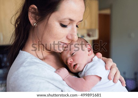 Similar – Image, Stock Photo Mother hugging her sleeping baby girl