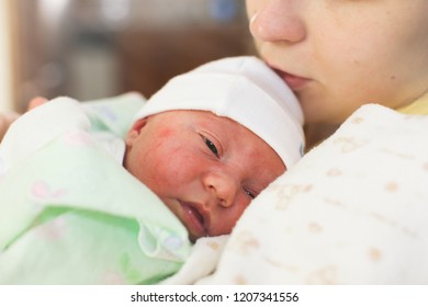 Young mother and newborn baby  - Shutterstock ID 1207341556