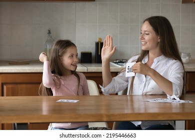 Young Mother Showing Maths Flashcards, Give High Five To Little Daughter, Praising 6s Child For Reaching Success In Multiplication. Give Correct Answer, Preschool Education, Class With Tutor Concept