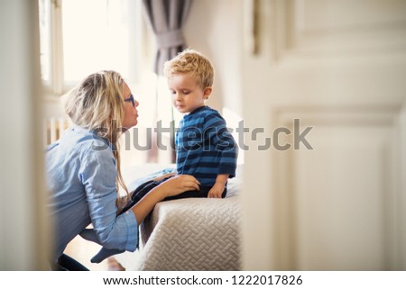 Similar – Image, Stock Photo Mother and toddler with mobile phone in hand