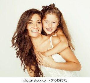 Young Mother With Two Children On White, Happy Smiling Family Inside Isolated