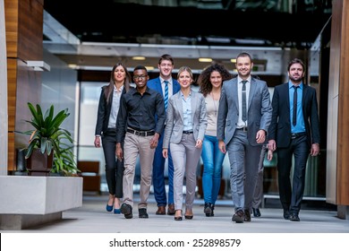 Young Multi Ethnic Business People Group Walking Standing And Top View