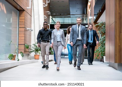 Young Multiethnic Business People Group Walking Standing And Top View