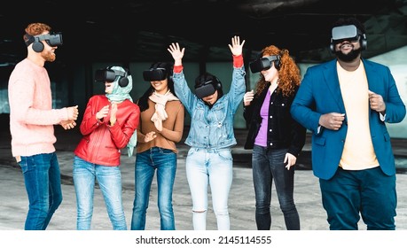 Young multiracial friends having simulation experience with futuristic virtual reality glasses - Technology and metaverse concept - Powered by Shutterstock