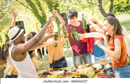 Young Multiracial Friends Toasting Beer At Barbecue Garden Party - Friendship Concept With Happy People Having Fun At Backyard Summer Camp - Food And Drinks Fancy Dinner With Dj Music Set Outdoors 