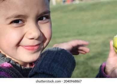 Young Multiracial Samoan Girl Playing Outside At Park