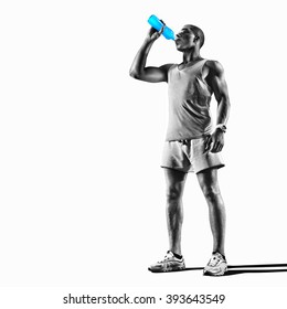 Young muscular build man silhouette drinking water of bottle after running, attractive athlete resting after workout outdoors, fitness and healthy lifestyle concept. Isolated on white