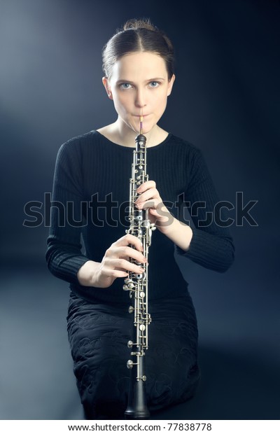 old lady playing oboe artclip