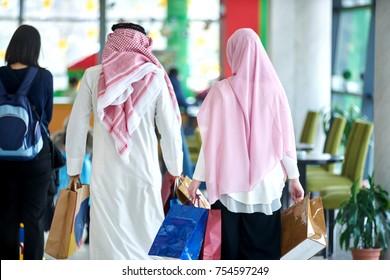 Young muslim couple shopping and having fun