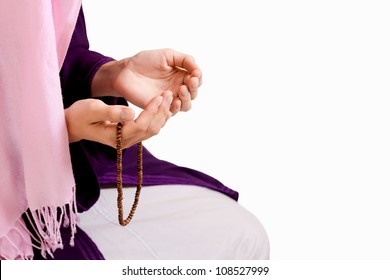 Young Muslim Girl With Rosary Praying On White Background