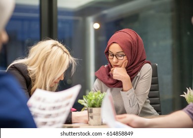 Young muslim hijab business woman in office, portrait