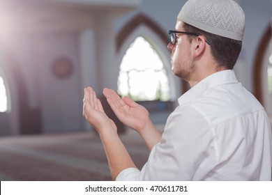 Young Muslim Man Is Praying In The Mosque