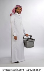 A Young Muslim Man With Shopping Bag In Hand In Super Market In Mall In Saudi Arabia Middle East Gulf