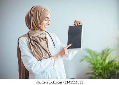 Young Muslim Person Doctor Woman Face On Isolated White Background Concept Islamic Healthcare In Tech Research Hospital Health Medical Care, Nurse Worker Hijab Hold Tablet Ipad
