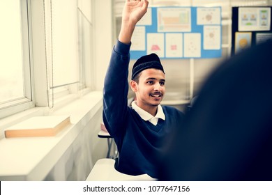 Young Muslim Student In Class