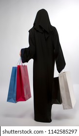 A Young Muslim Woman With Shopping Bags In Hand In Super Market In Mall In Saudi Arabia Middle East Gulf