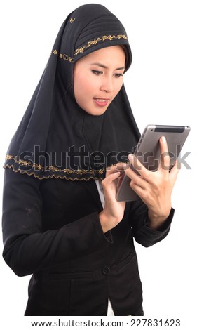 young muslim woman with smartphone isolated on white background